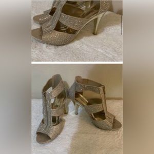 Gold diamond zip up heels. Size 11 worn once.  Excellent condition.
